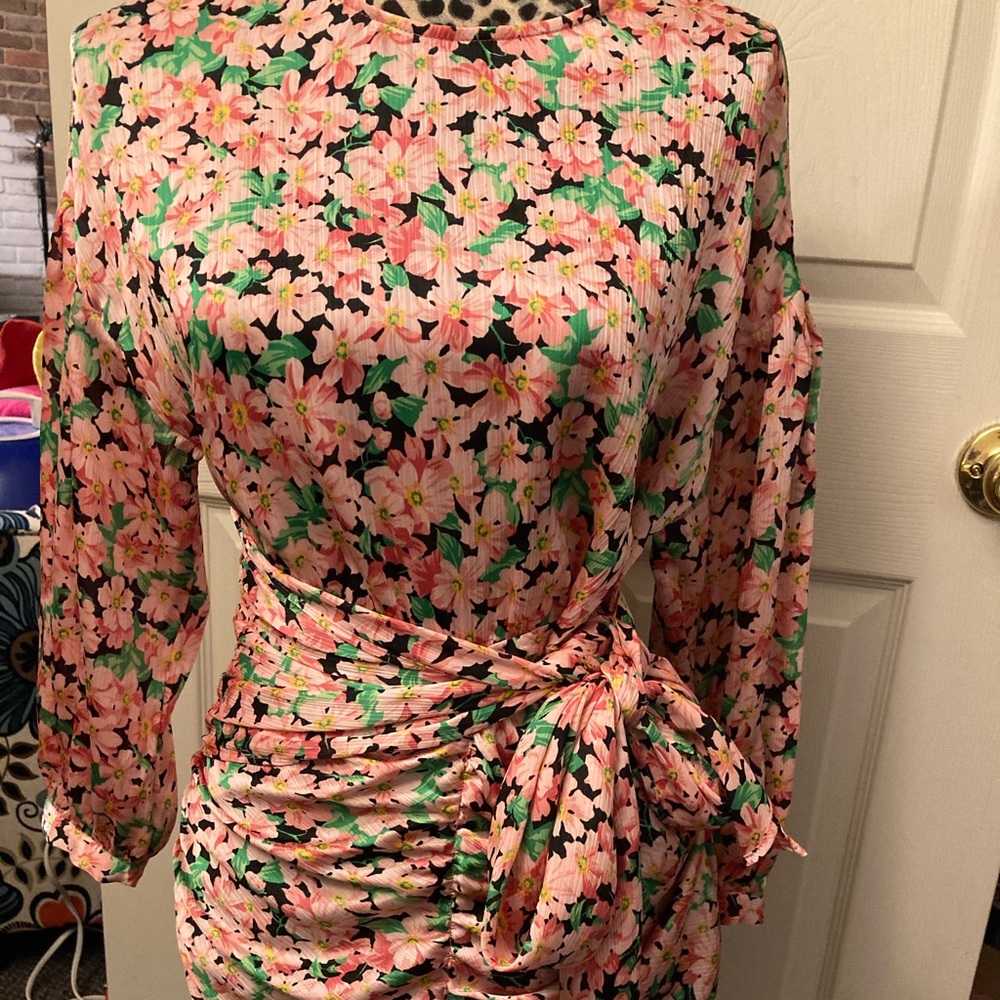Short, floral dress with side tie.